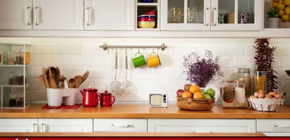Make Ready Home fall kitchen update ideas with white cabinets, colorful mugs, fresh produce, and cozy holiday accents.