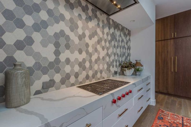 Make Ready Home fall kitchen update ideas showing a modern gray hexagon backsplash and marble counters for a bold design.