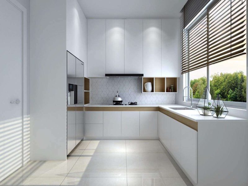 Minimalist white kitchen by Make Ready Homes with built-in fridge, bright lighting, and modern cabinets.